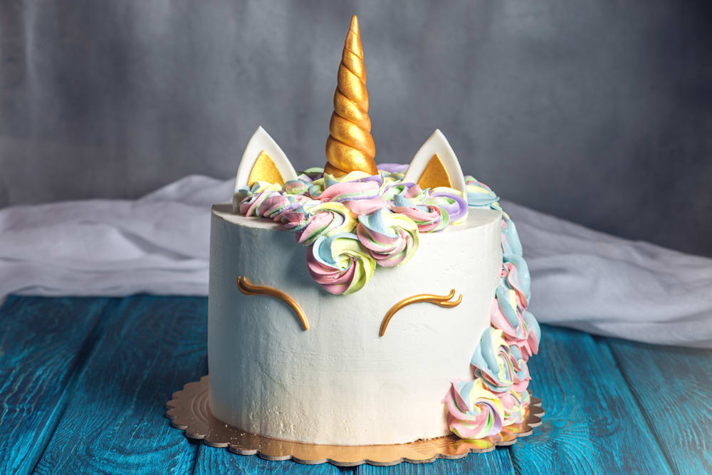 Gold Unicorn & White cream Cake